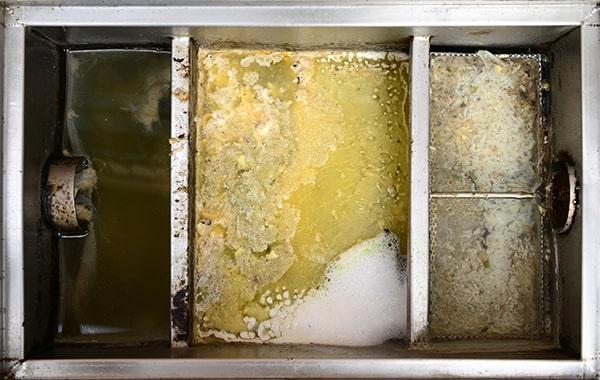 Grease trap cleaning San Francisco CA: Vacuum pump truck used to pump out grease traps and interceptors